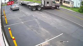 Semi-Trailer Rearranges Anything In The Way Of Turning Around...