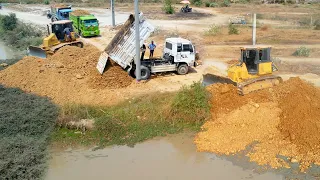 Starting New Project Showing Action Dump Truck Nice Professional Work Of Bulldozer Pushing Soil