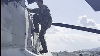 video of Marines preparing to fly a CH-47 Chinook helicopter