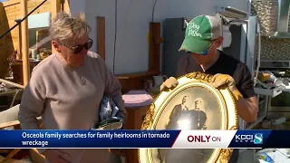 Finding a needle in a haystack: Osceola family looks for precious memory in tornado wreckage