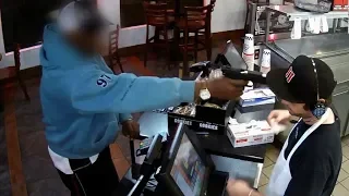 10 Times Cashiers Fought Robbers Caught On Camera
