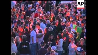 Hundreds attended a sunset candlelight vigil on Sunday to honor the 13 victims of the Columbine High