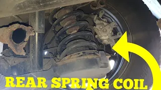 peugeot partner/ Citroen berlingo  rear spring coil replacing (D I Y )