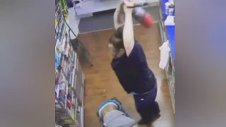 Woman Fights Off Robber With Fire Extinguisher [CAUGHT ON TAPE]