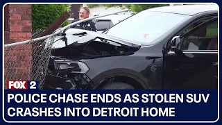 Police chase ends as stolen SUV crashes into Detroit home; 2 suspects arrested