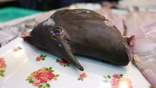 Японская уличная еда - единорог рыба сашими Окинава Япония морепродукты