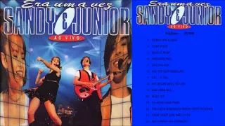 12. EM CADA SONHO [O AMOR FEITO FLECHA] ( My Heart Will Go On) | Sandy & Junior (Ao Vivo)  ℗ 1998