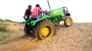 Testing the power and capacity of JOHN DEERE 5045D Tractor in river sand dune