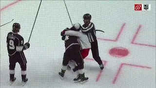 Philip Danault and Sean Kuraly grapple after the whistle.