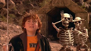 The spy child took the treasure and got a fight with the skeleton