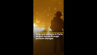 Fires and protests in Paris as govt forces pension reform