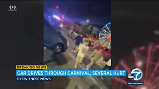 People rush to get out of the way after driver plows through South LA street carnival