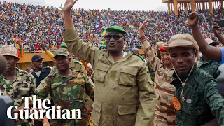 Niger: thousands gather for rally to cheer coup generals as junta closes airspace