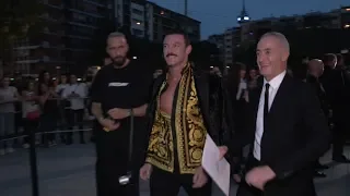 Luke Evans, Rosie Huntington Whiteley and more arrive at Versace Fashion Show in Milan