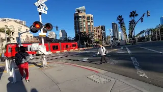 Market Street crossing activates as a Trolley pulls into a station