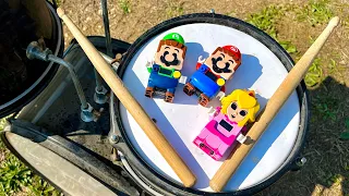 Can Lego Mario and Luigi play the drums and get to the treasure? Which song did they choose?