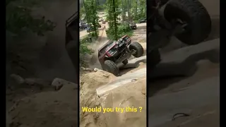 Jeep Xj sending 30 ft rock wall