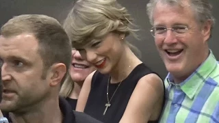EXCLUSIVE: Taylor Swift Wears LBD For Flight To Tokyo With Parents