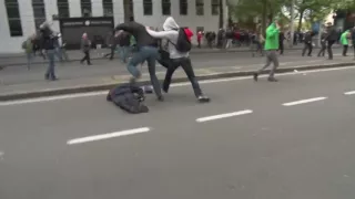 Raw: Protester Knocks Out Brussels Police Chief