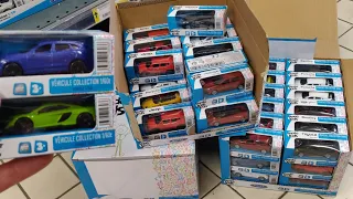 A box filled with Welly cars!