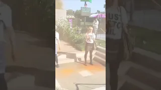 Woman hoses down Just Stop Oil protesters at Chelsea Flower Show