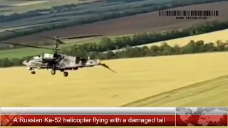 A Russian Ka-52 helicopter flying with a damaged tail
