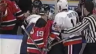 Claude Lemieux punches Brett Lindros from the bench