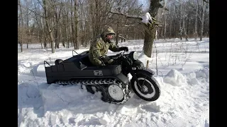 NSU Kettenkrad rides in the winter forest