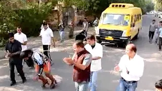 Man Pulls Truck With Hair On Skates