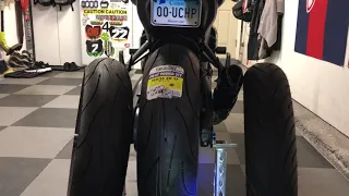 Yamaha YZF R3 with complete rim and tire conversion to 5.5” rim and 180-55-17 tire.