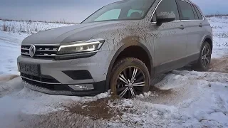 Volkswagen Tiguan зимой на проселочной дороге