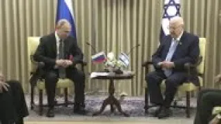 Putin meets Israeli president in Jerusalem