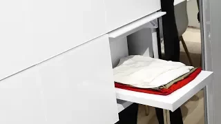 Panasonic presents a washing machine that folds your clothes and a fridge that comes when called