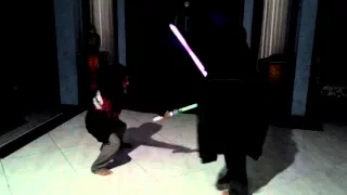 Kids playing stars wars light saber