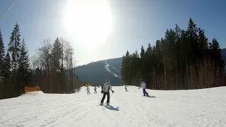 Snowboarding in Bukovel, ski resort in Ukraine. Karpaty mountains.