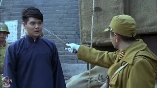 Underestimating the young man, Japanese troop intercepts him, but he's actually a Kung Fu master.