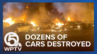 Dozens of vehicles damaged or destroyed in car lot fire west of Jupiter