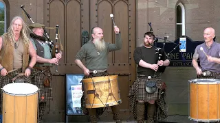 Thundering Drums of Clanadonia, the wild men of Scottish Street Pipes and Drums outside Scone Palace