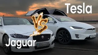 Tesla vs Jaguar/Mark Dixson.