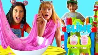 Toia e Maria Clara em a Loja de Slime do Ro I Pretend Play and Mixing Slime ft @MariaClaraeJP