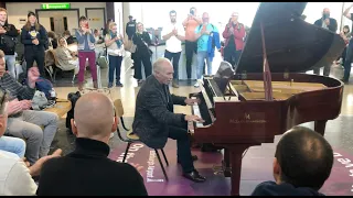 Rock 'n' Roll piano legend, Stan Urban's encore for travellers at Edinburgh Airport.