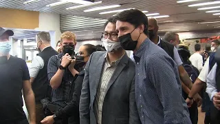 Re-elected Justin Trudeau greets Montreal commuters