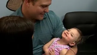 Baby born deaf hears parents' voices for the first time