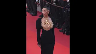 Bella Hadid at the premiere of Cannes in a Gold-dipped bronchi necklace.