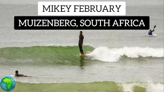 MIKEY FEBRUARY SURFING A LONGBOARD