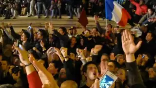 Parisians sing La Marseillaise at Place de la Bastille