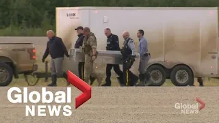 RCMP load bodies believed to be BC murder suspects onto Winnipeg-bound planes for autopsies