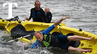 Sir Ed Davey tipped from kayak at the Lib Dem party conference