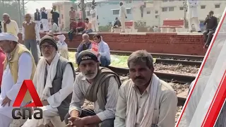 Indian farmers protest on railway tracks, disrupting train services for hours