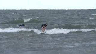 VIDEO | High winds on Cleveland lakefront send some surfing
